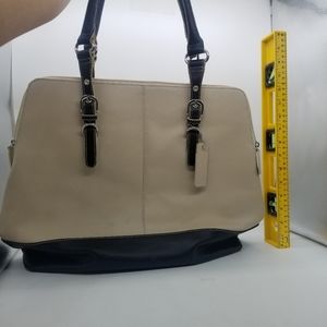 Wilson leather Black and Tan handbag with leopard print inside lining